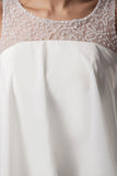 Ivory beaded high-low ruffled prom dress, full length view